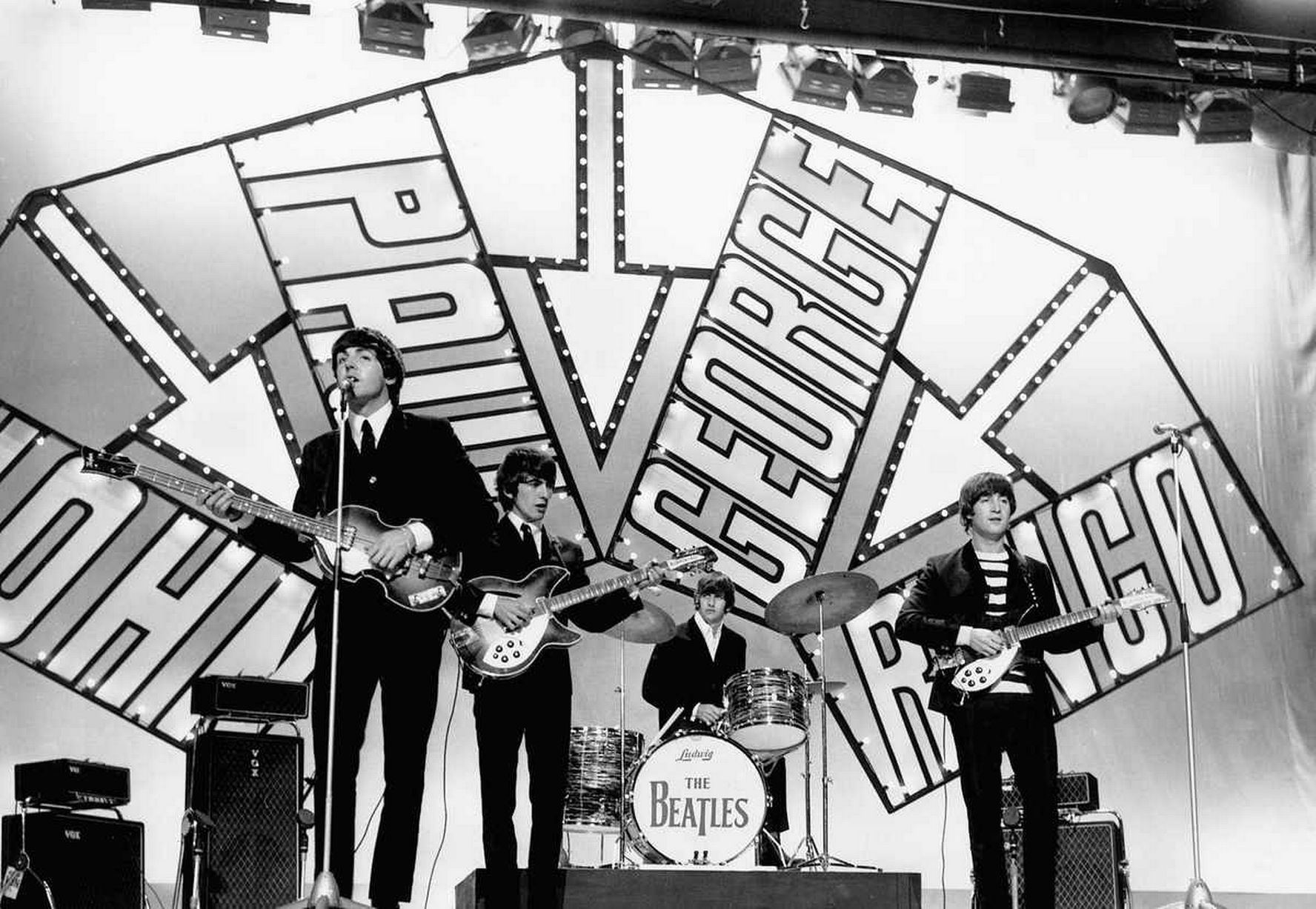 The Beatles perform. The Doors on Stage.